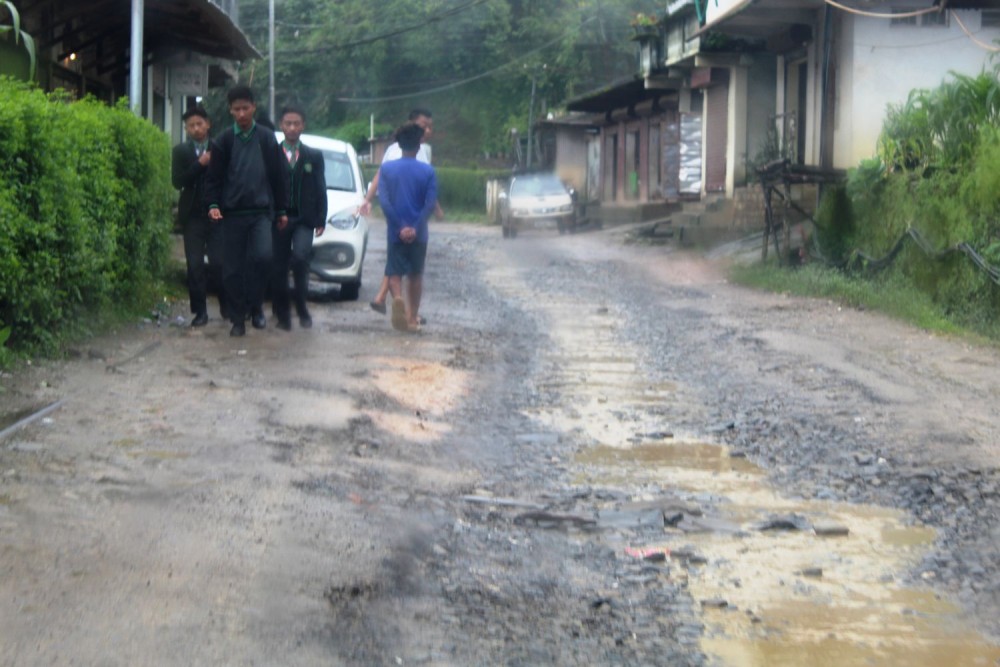 A view of the pathetic road condition at North Point Colony Zunheboto. (Morung Photo)